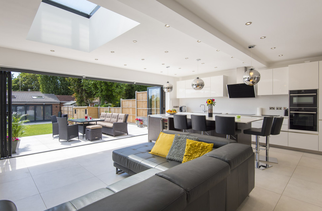 Bright open-plan kitchen and living space with garden glazing